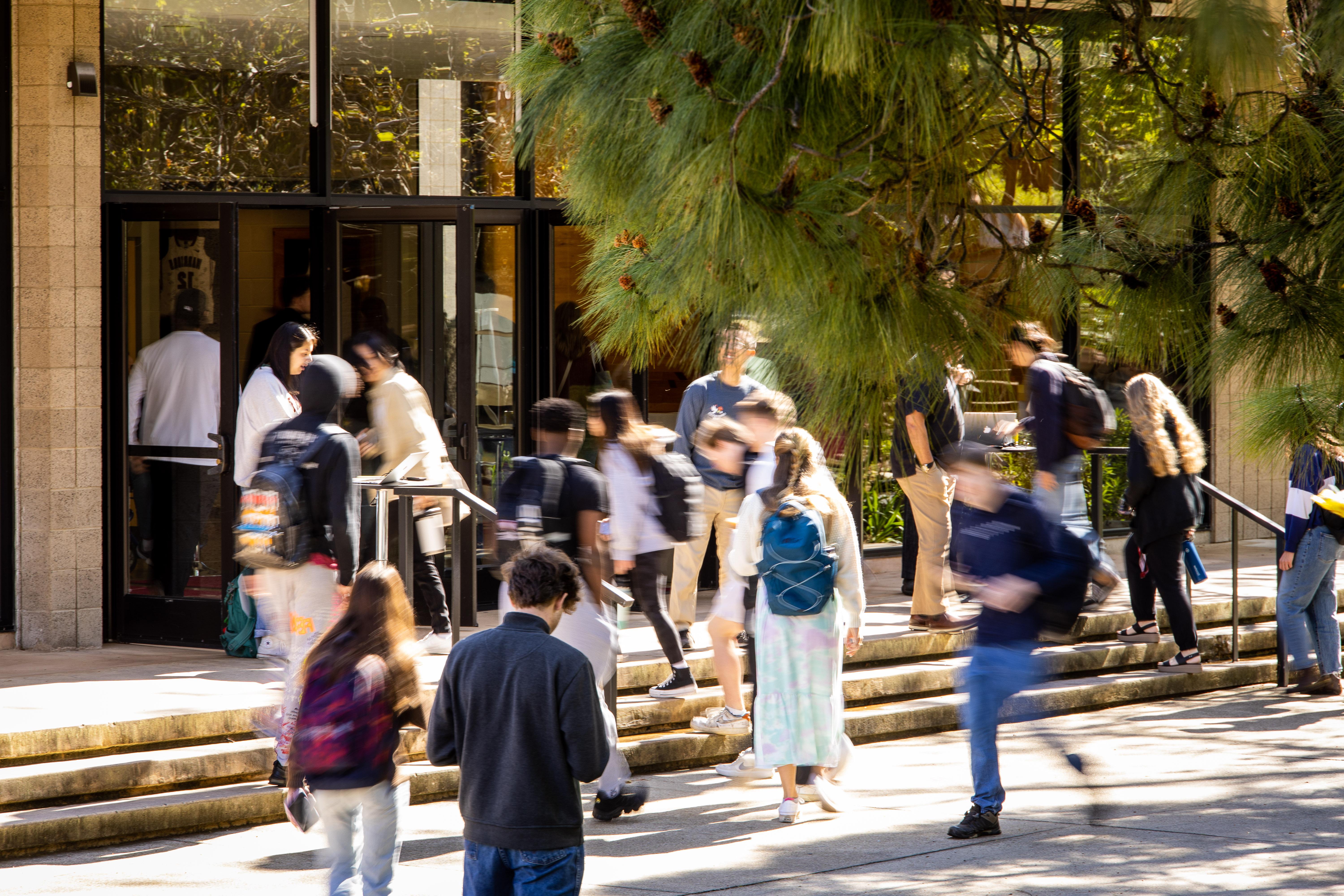 students walking on campus